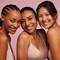 3 mulheres com a pele bonita e radiante sorrindo